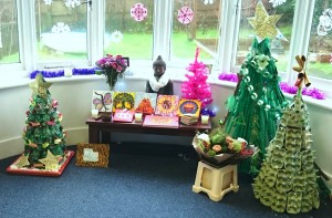 Leaving presents for Bea and class Christmas trees made from recycled materials